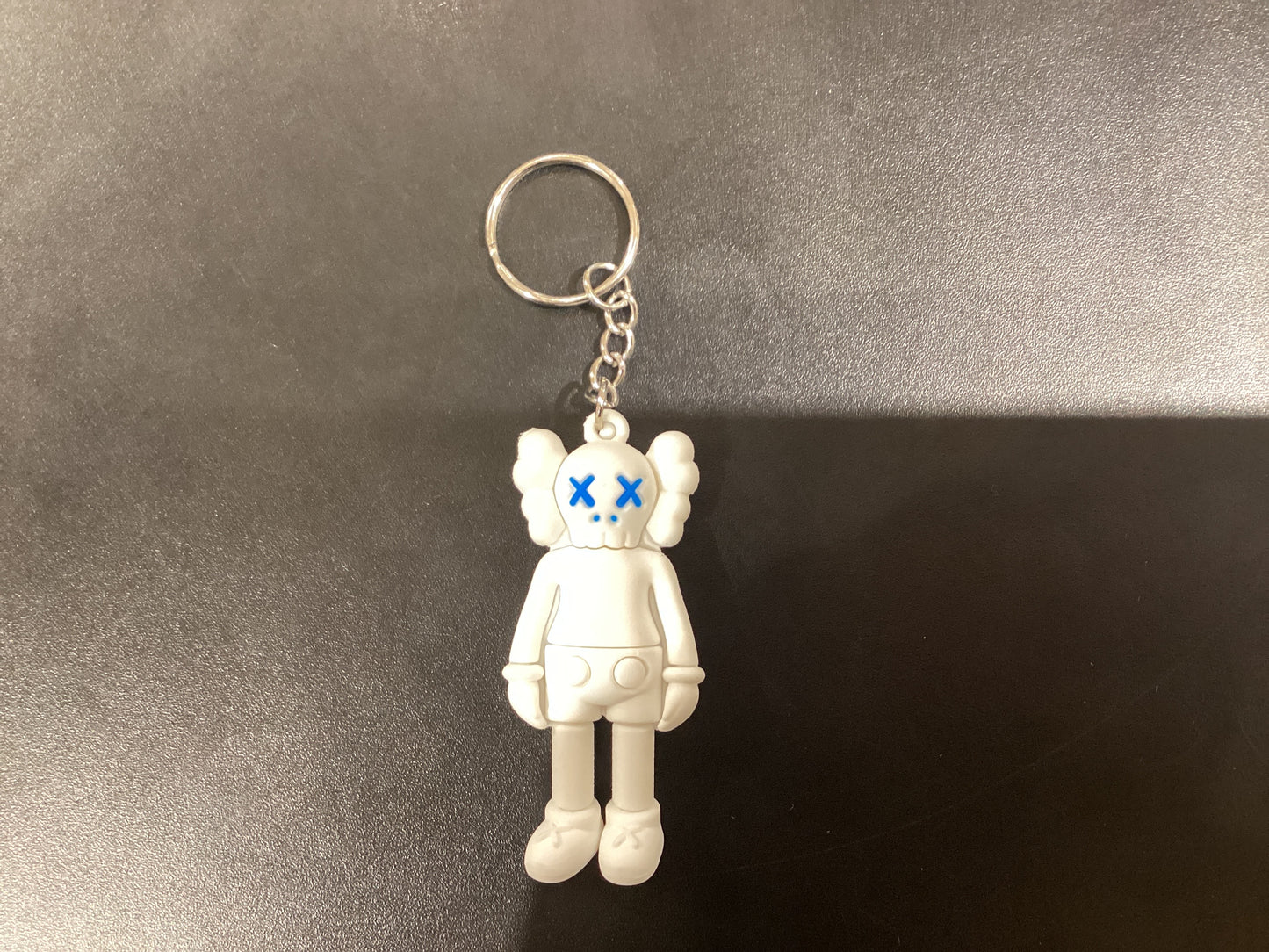 White Kaws KeyChain