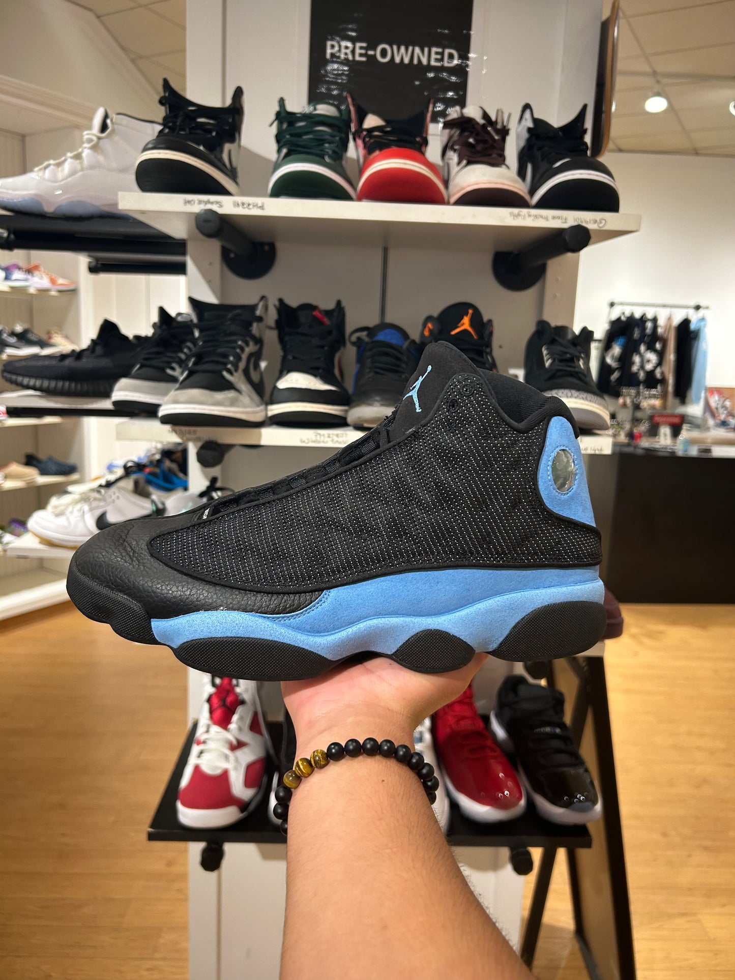 Air Jordan 13 Retro Black
University Blue (PRE-OWNED)