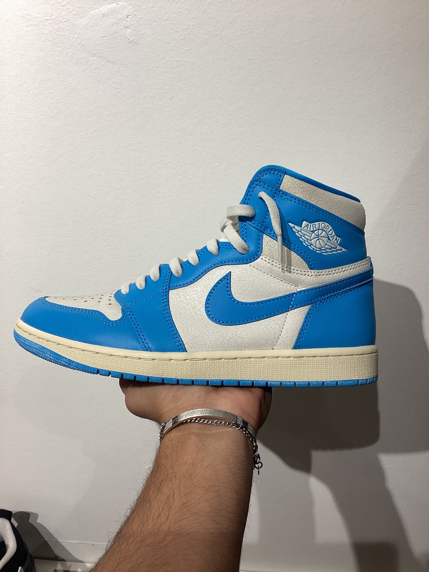Air Jordan 1 Retro High OG UNC
Reimagined (PRE-OWNED)