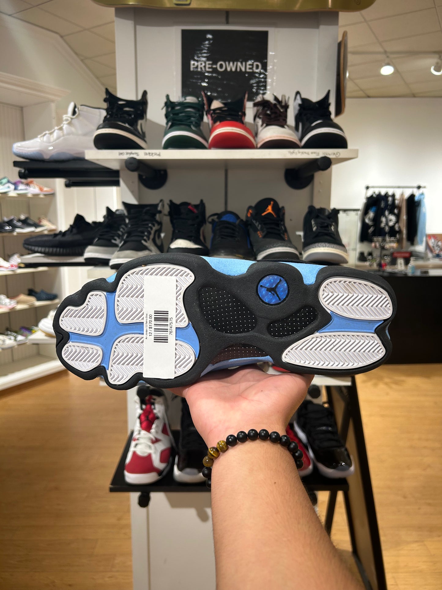 Air Jordan 13 Retro Black
University Blue (PRE-OWNED)
